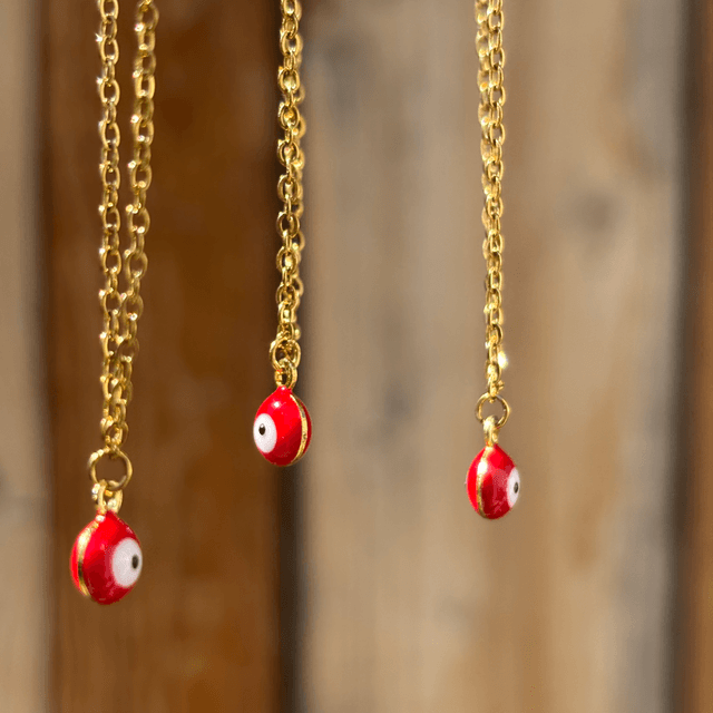 Collier mini œil rouge
