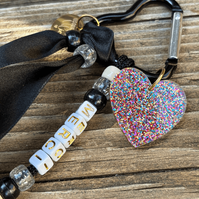 Porte-clés Grigri MERCI black