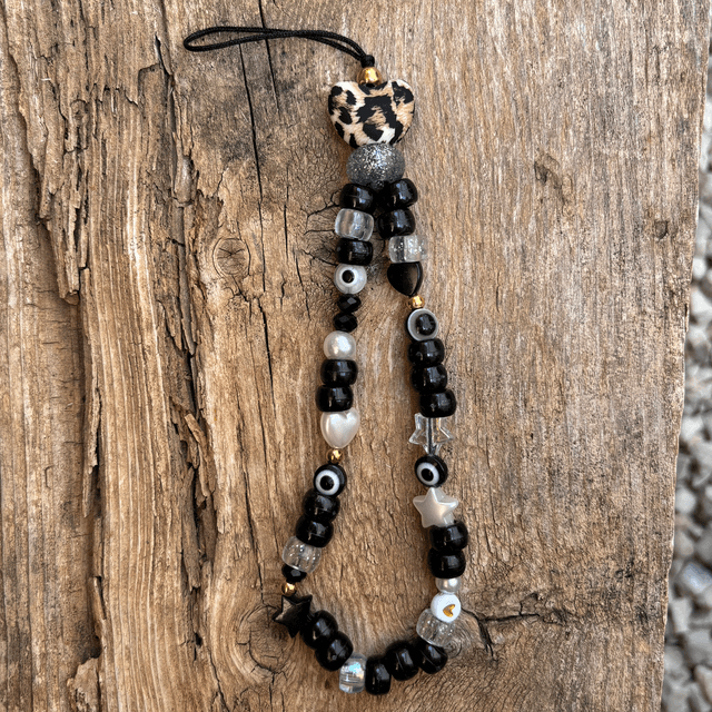 Grigri de téléphone Bonbon d’Amour 🐆 Black coeur léopard